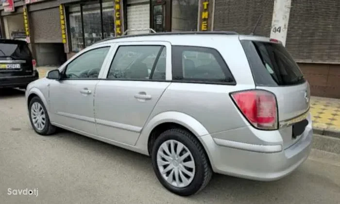 Лобовое стекло Opel Astra H 