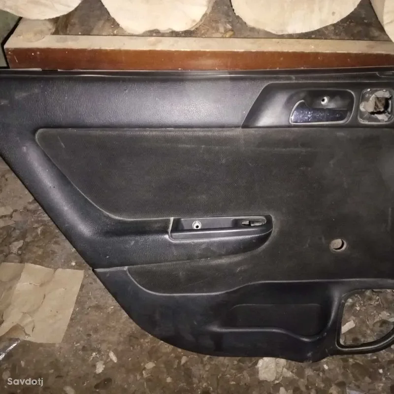 Обшивка дверь на Opel astra g