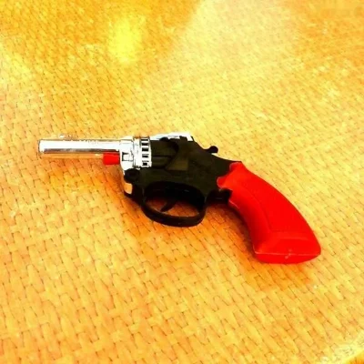 Игрушка пистолет пороховой — миниатюра 1