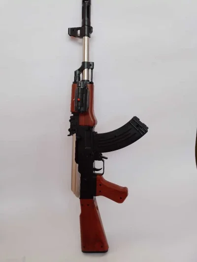 Автомат игрушечный с лазером — миниатюра 1
