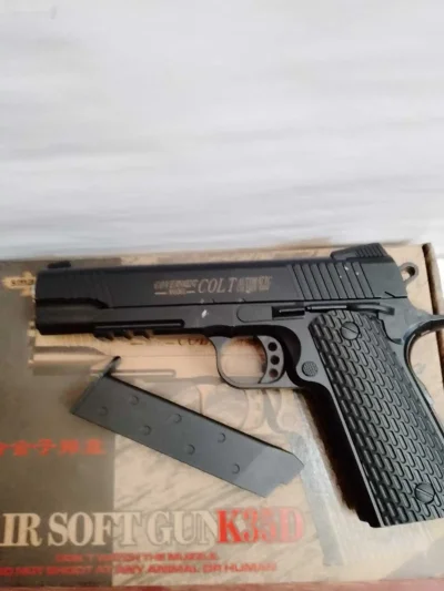Пистолет металлический игрушечный k35d — миниатюра 1